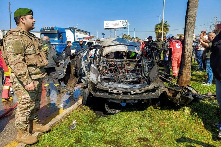 The Lebanese army, the security forces and the first civil defense stakeholders inspect the remains of a destroyed vehicle which would have been struck by an Israeli strike in the city of southern Lebanon in Sidon on February 17, 2025. The media Lebanese officials said the strike had killed a person, one day before a deadline in a cease-fire between Israel and Hezbollah. "A body ... was recovered from the car targeted by the Israeli strike" in Sidon, "After the firefighters have turned off the fire"said the official national press agency. (Photo by AFP)