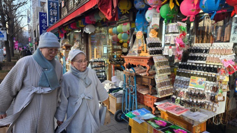 Buddhists shop in Buddhist stores next to the Seoul Temple