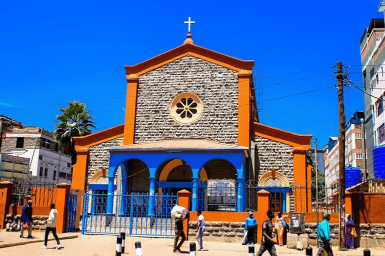 The pedestrians pass in front of the Catholic church of the Sterers' claws on ... Nairobi, Kenya - 2023/02/13: pedestrians pass in front of the Catholic church of St. Peters claw on Uyoma Street in the central business district. Central Business District of Nairobi is the city's commercial activities center, making it an appropriate environment for investors and entrepreneurs to build their businesses, their commercial spaces and their offices. Therefore, it has become one of the city's tourist attractions. (Photo by Donwilson Odhiambo / Sopa Images / Lightrocket via Getty Images)